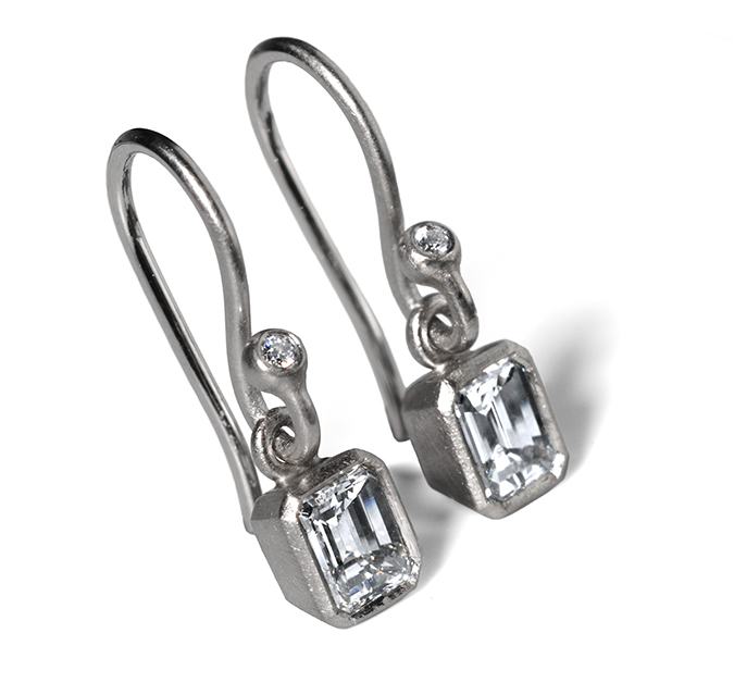 Platinum emerald cut earrings